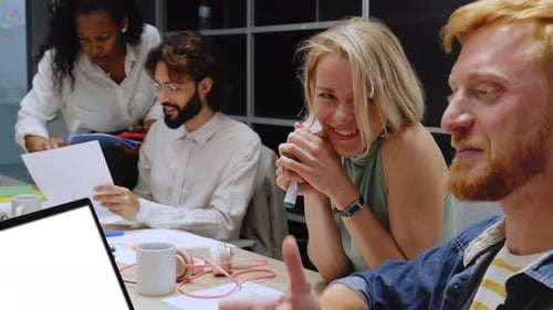 Diverse Team Business Professionals Gathered in Office Conference Room