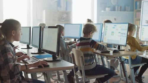 Elementary School Science Classroom: Teacher Educates Smart Little Schoolchildren who Work on Perso