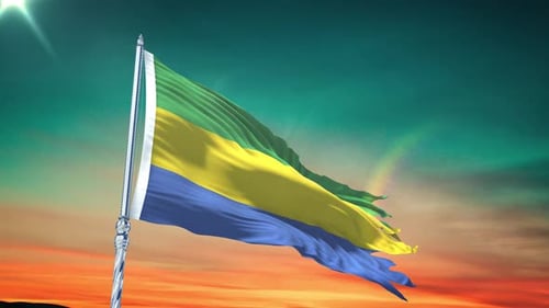 Gabon Flag Waving In Wind Against Sunset Sky