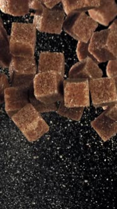 Cane Sugar Cubes Fly Up and Fall Down Filmed on a Highspeed Camera at 1000 Fps