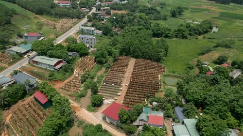 Large Openair Cut Wood Warehouse in a Small Village in Vietnam From Drone View