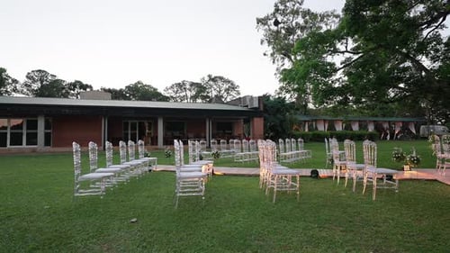 Empty Chairs Set Up for an Outdoor Wedding Ceremony