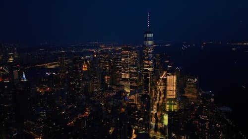 Multiple city lights of glamorous New York at night.
