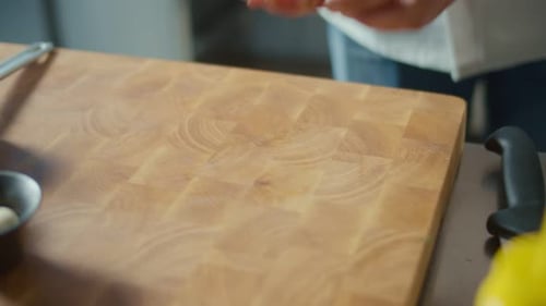 Chef Preparing Raw Meat on Cutting Board