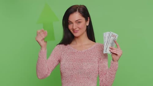 Woman Holding Money With Up Arrow on Green Screen