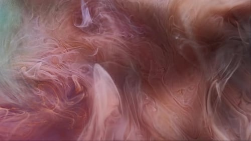 Light Orange and White Inks Swirling Abstractly