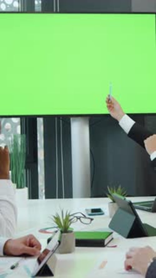 Business Team Meeting in Office with Chroma Key Screen