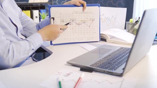 Data Review Presentation in an Office Workplace