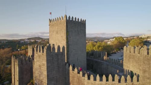 Slow left aerial view of the castle of Guimaraes