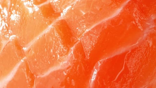 Close-up of thinly sliced salmon.