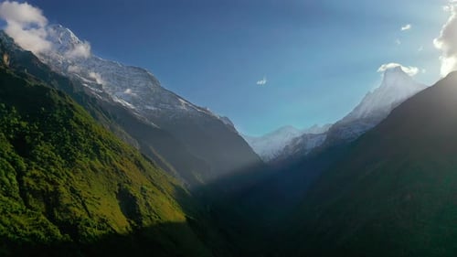 Aerial drone view flying through the magnificent Annapurna Mountain Range in the Himalayas, Nepal
