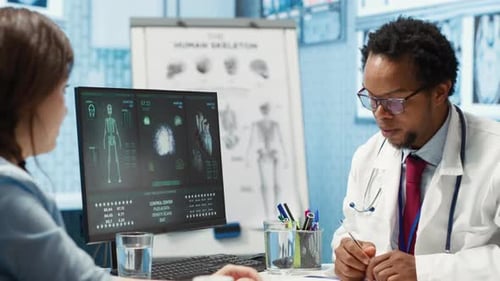 Doctor Consults Patient on Health with Medical Technology