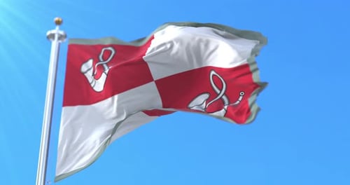 Realistic 3D Waving Flag with Corporate Emblem Under Blue Sky