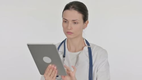 Doctor Using Tablet in Clinical Setting