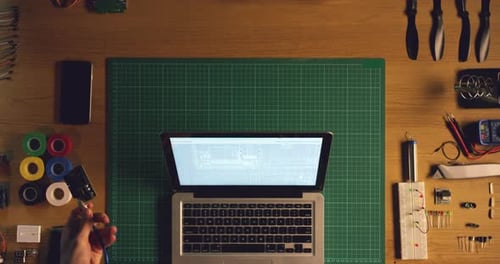 Laptop hacking, hands and technician with hardware, screen and coding software system for upgrade