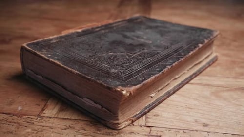 Antique Bible’s cover showing a cross