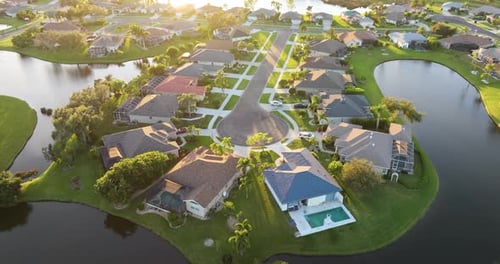 Aerial View of Private Homes in Florida Residential Area at Sunset New Family Houses As Example of