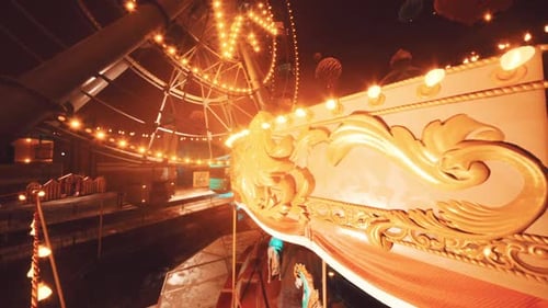 Empty Amusement Park at Night with Glowing Lights and Quiet Rides