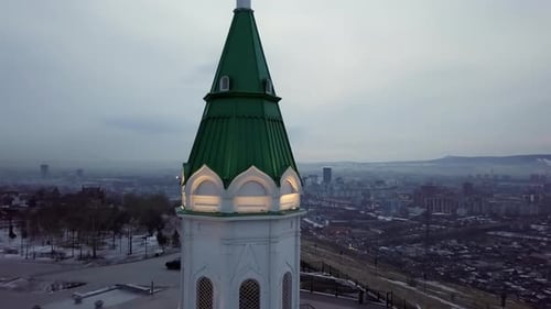 A Beautiful and Historic Tower That Majestically Overlooks a Stunning Cityscape at Dusk Time Stock