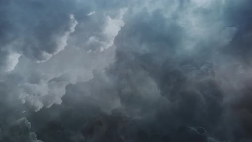 4k thick clouds in dark sky and thunderstorm.