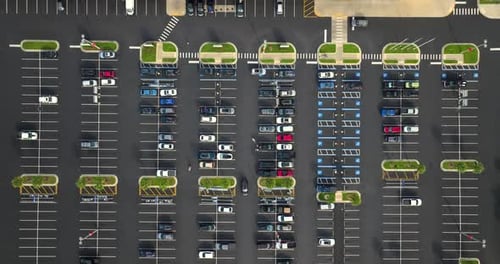 Cars Parked on Parking Lot with Lines and Markings for Parking Places and Directions Place for