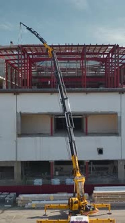 Vertical Video Vertical Construction Site Material Handling for the Towering Shopping Center