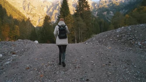 Beautiful Female Traveler Walks Through the Forest to the Mountains Incredibly Beautiful Views in