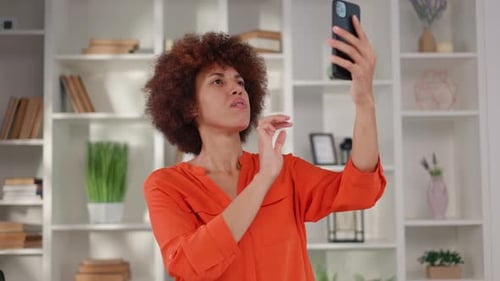 Woman Tries to Get Better Mobile Phone Reception