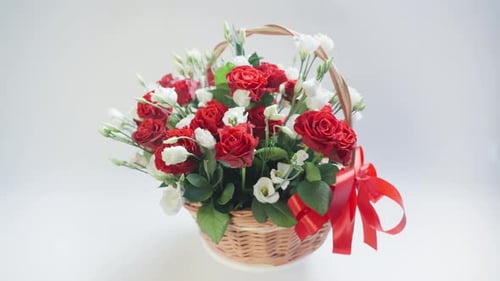 Basket of Red Roses and White Flowers