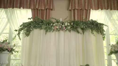 Floral Draped Event Backdrop with Soft Daylight