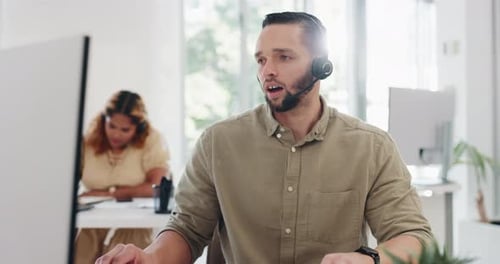 Call center, customer service and man on computer consulting in office