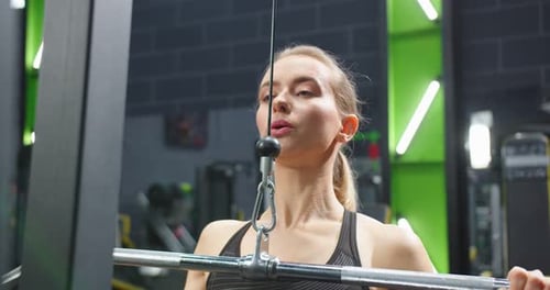 Trx Fitness Straps in the Gym Active Tired Strong Caucasian Women Training Arms in Activity Centre