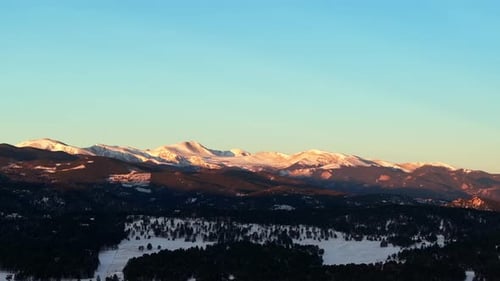 Mount Blue Sky Evans 14er Evergreen Meadows Conifer Colorado aerial drone golden cold sunrise