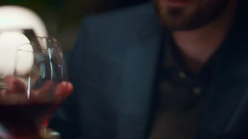 Couple Clinking Wine Glasses in Fine Dining Restaurant. Unknown Romantic Partners Make