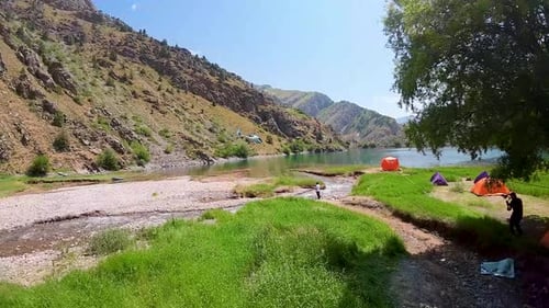 First-person view of flying helicopter over the jade Urungach lake
