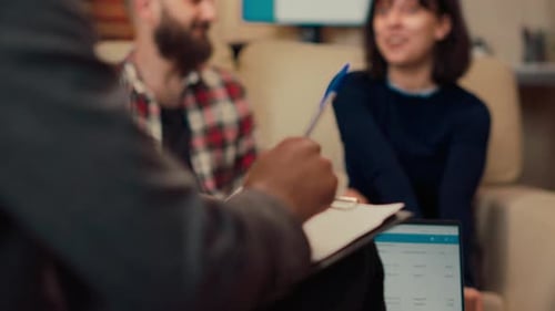 Couple Embraces at End of Therapy Session
