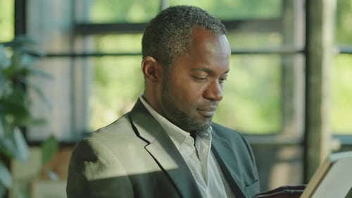 Closeup Side View of Confident Gorgeous Businessman Working in Office Portrait of Smiling