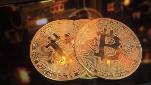 Gold Bitcoins Abstract Close Up with Tech Background