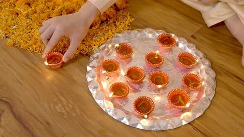 Festive Clay Lamps Lit for Diwali Celebration