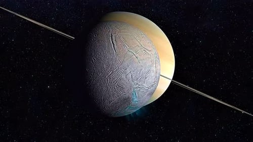Moon Orbiting Ringed Planet Saturn in Deep Space