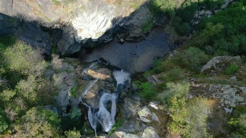 Top View Of Fervenza do Toxa Waterfalls Flowing Over Steep Mountains In Silleda, Pontevedra, Spain.