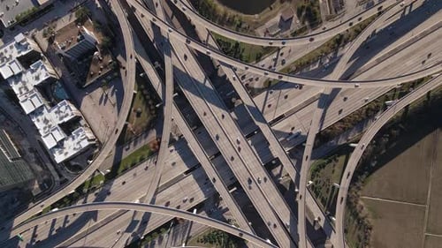 Top-down aerial view of Interstate I-10 freeway and Bellway 8 Houston Texas. Rotating Bird Eyes shot