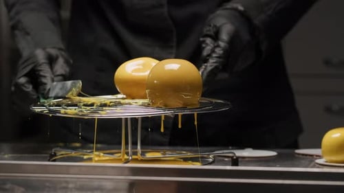 Woman Chef Confectioner Pouring Caramel on Mousse Pink Cake Creamy Dessert Closeup Gastro Art