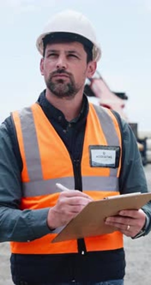 Construction, outdoor or manager writing for inspection, safety compliance or development check
