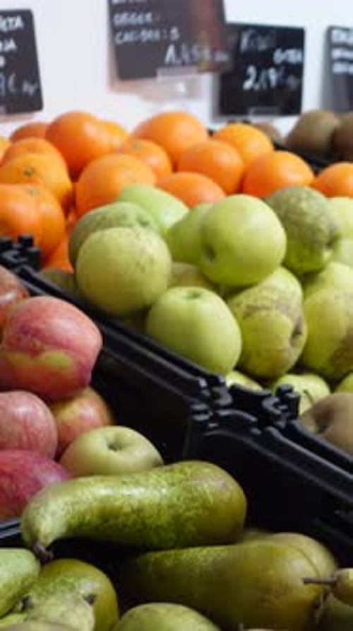 Vertical Video of Fruit at Market with Prices