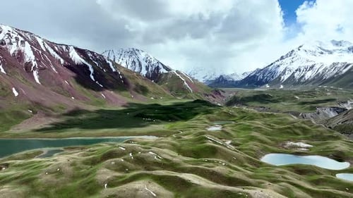 Valley and Snowy Mountains