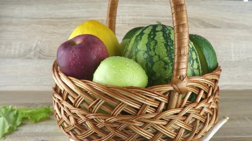 Basket of Fresh Fruits: Watermelon, Melon, Apple, Avocado
