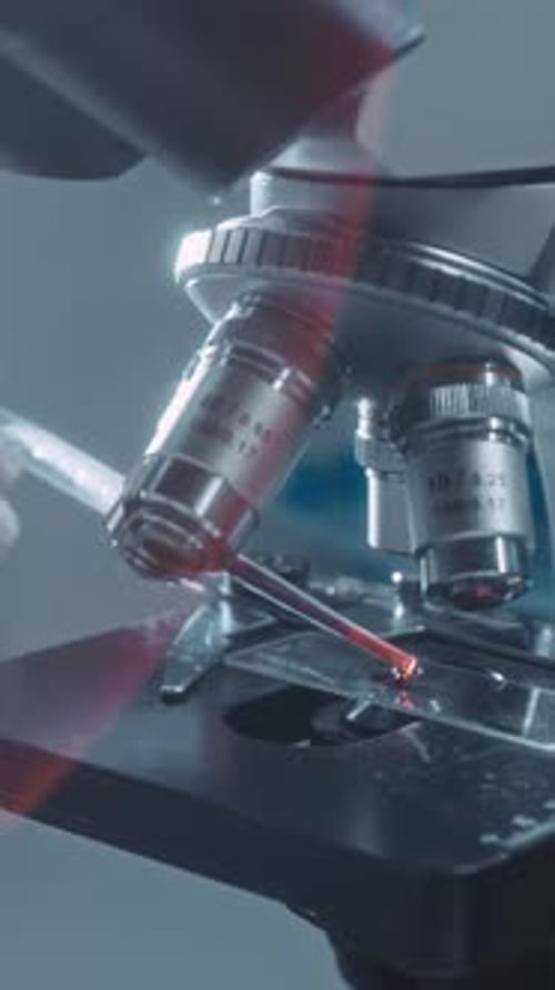 Microscope with Blood Slide in Lab Setting