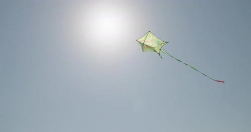 A Closeup of a Kite Flying Across the Sky Fun Children's Games in the Air