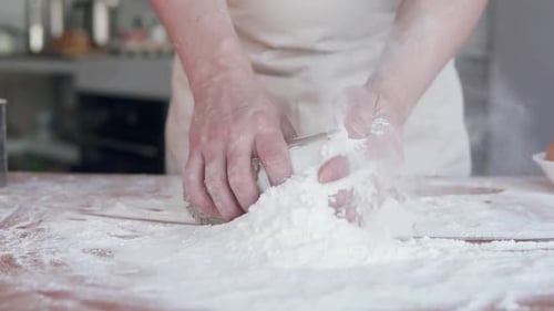 Hands Adding Flour in Kitchen for Baking